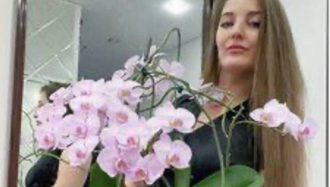 Сургутянка попала в книгу рекордов России, вырастив орхидею с наибольшим количеством  цветков